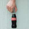 les boissons non alcoolisées en verre 370ml mettent en bouteille l'emballage en verre de soude de cola avec le logo fait sur commande