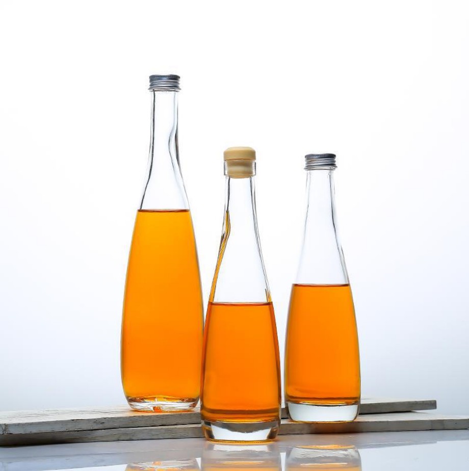 Bouteilles en verre de haute qualité pour l'emballage de boisson en verre d'eau minérale