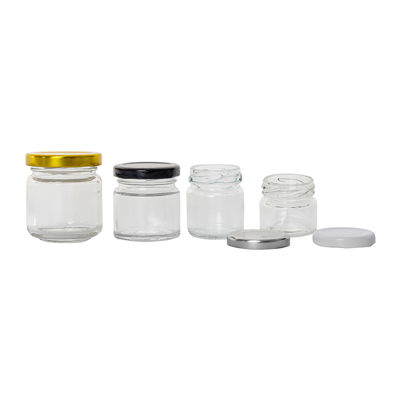Pors de miel de 25g de petits confitures de verre avec des paupières en métal