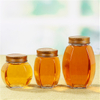 Grands pots de confiture de stockage de nourriture en verre d'hexagone ovale de gros pots de miel