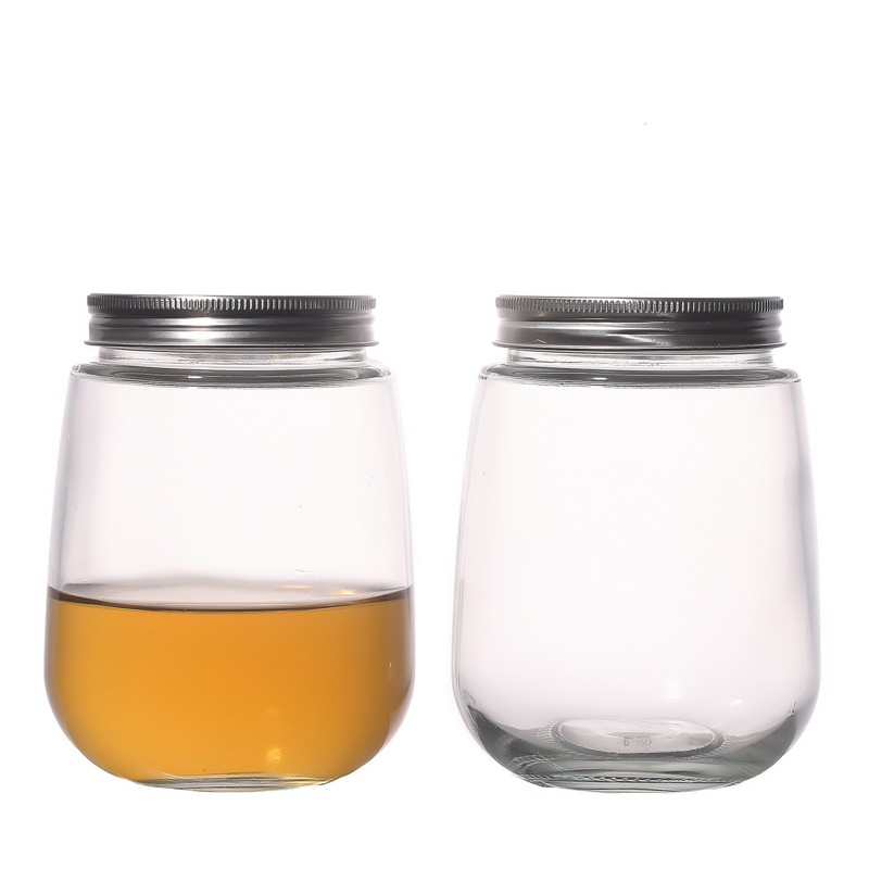 Bouteilles de jus en verre en forme d'oeuf avec couvercles pour boire des boissons